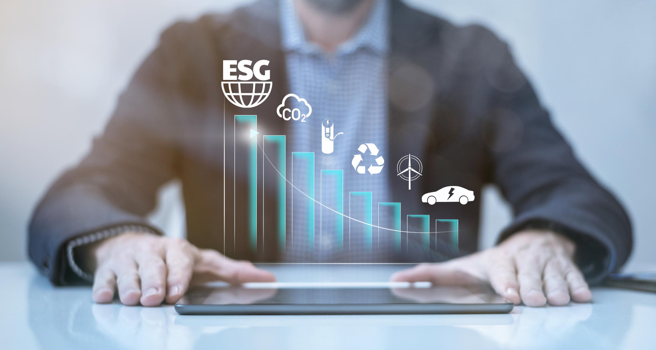 Businessman using tablet computer. ESG environmental social governance concept. Business strategy
